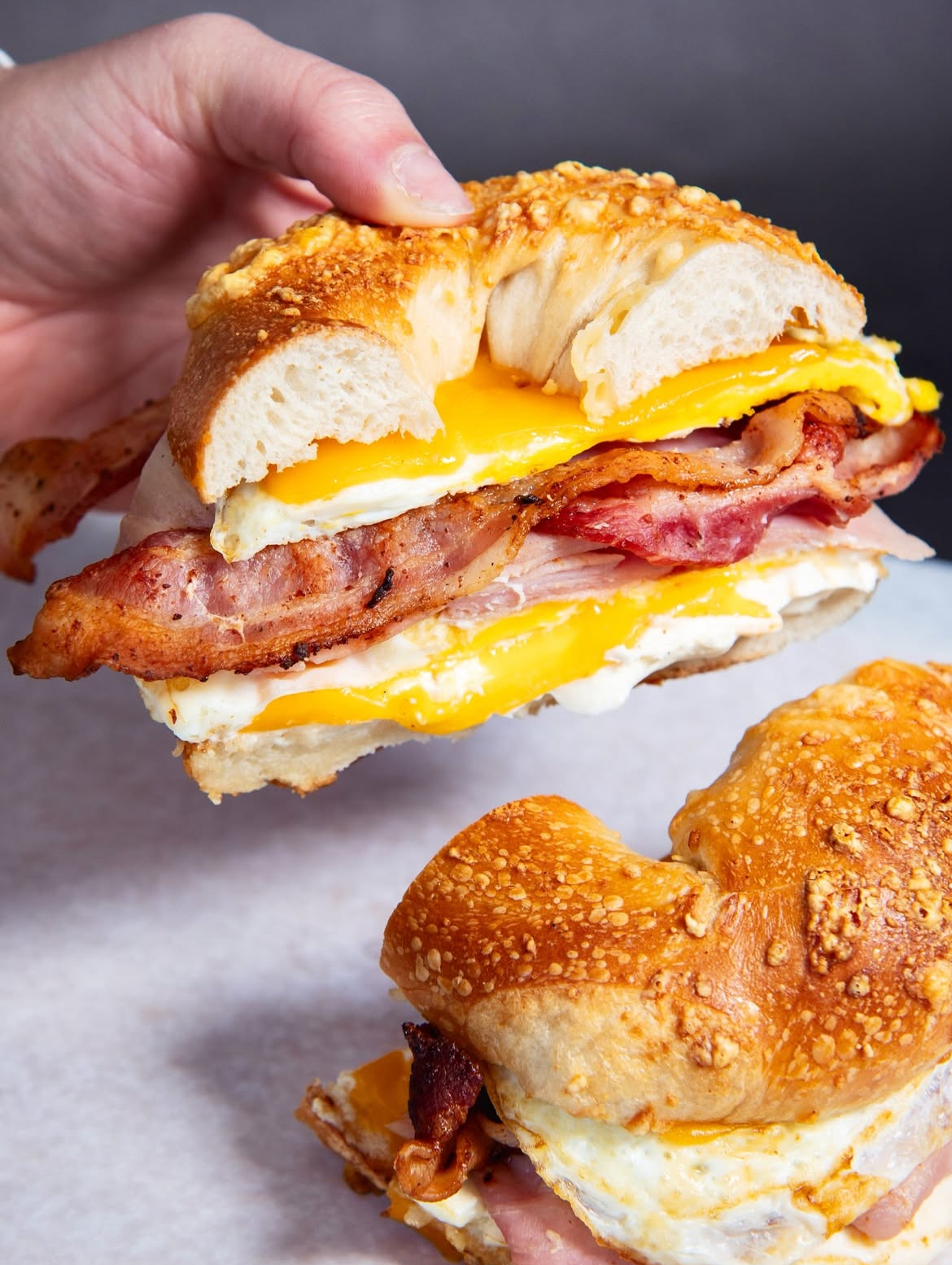 Asiago bagel breakfast sandwiches with bacon and egg